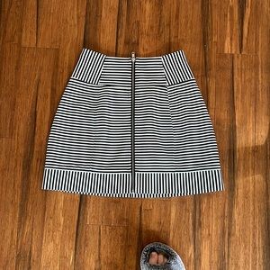 Black and white striped front zip skirt. Cut25